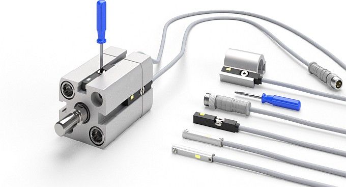 Configuração de detecção de posição em cilindro pneumático com fiação de sensor externo e contexto de controlador de automação.